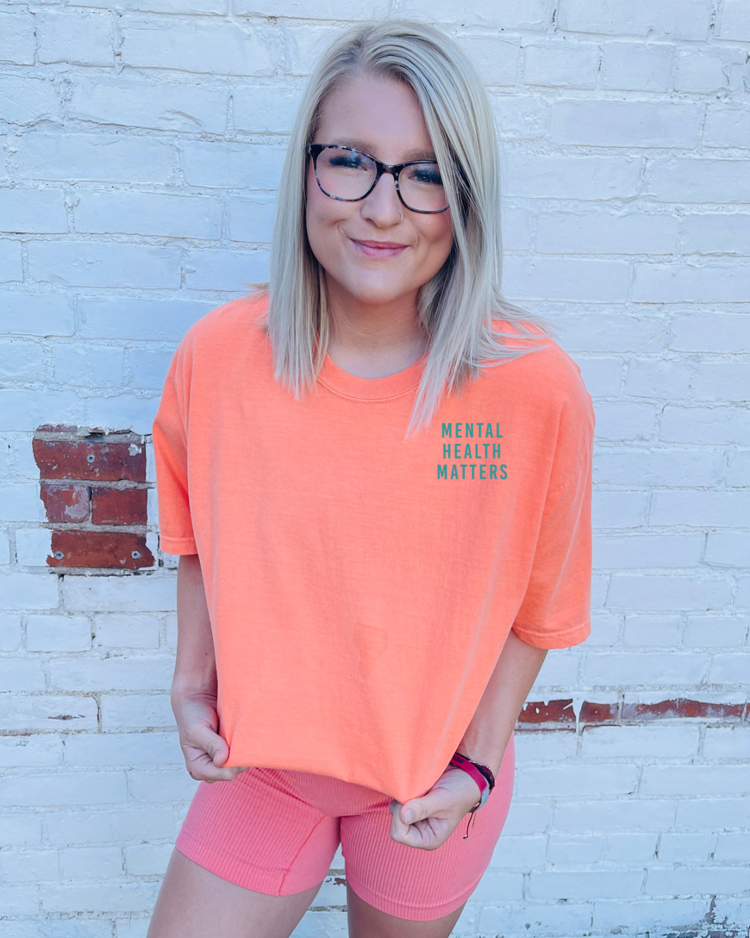 This Mental Health Matters graphic tee by Comfort Colors is a perfect way to make a statement in style. Featuring vibrant colors and a blue design, this tee is sure to stand out. It has an oversized fit for maximum comfort. Show your support with this must-have statement piece!